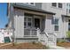 Charming two-story home with Hardie board siding, welcoming front porch, and professional landscaping at 2455 Alpine St, Longmont, CO 80504