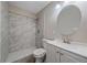 Well-lit bathroom with a tiled shower, modern vanity, and updated fixtures at 4110 Hale Pkwy # 1E, Denver, CO 80220