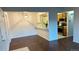 Bright living area with wood floors flowing into an open kitchen space at 459 Wright St # 202, Lakewood, CO 80228