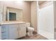Bathroom with shower, toilet and single vanity at 12983 W Ida Ave # 400, Littleton, CO 80127