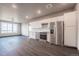 Modern kitchen with stainless steel appliances and ample cabinet space at 12983 W Ida Ave # 400, Littleton, CO 80127