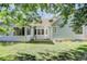 Backyard view with a well maintained lawn at 6055 W Warren, Lakewood, CO 80227