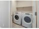 Laundry room with Whirlpool washer and dryer at 15866 Little Bluestem Rd, Monument, CO 80132