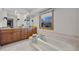 Bathroom with double vanity, soaking tub, and tile flooring at 1640 W 113Th Ave, Denver, CO 80234