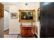 Elegant foyer featuring a decorative chest beneath a large, framed painting at 5455 Landmark Pl # 1116, Greenwood Village, CO 80111