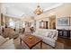 Spacious living room featuring hardwood floors and an open layout design at 5455 Landmark Pl # 1116, Greenwood Village, CO 80111