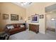 Comfortable office with sofa, wooden dresser, and natural light at 5455 Landmark Pl # 1116, Greenwood Village, CO 80111