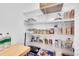 Pantry with wire shelving, providing abundant storage for food and supplies at 11865 Barrentine Loop, Parker, CO 80138