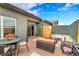 Charming patio with comfortable seating, ideal for enjoying the outdoors with privacy fencing at 11865 Barrentine Loop, Parker, CO 80138