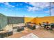 Cozy patio area, perfect for outdoor relaxation and entertaining under sunny skies at 11865 Barrentine Loop, Parker, CO 80138