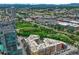 Breathtaking aerial view of a luxury high-rise overlooking a park and city skyline at 1700 Bassett St # 101, Denver, CO 80202