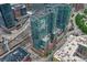 Excellent aerial view of a modern high-rise building in a bustling urban area at 1700 Bassett St # 101, Denver, CO 80202