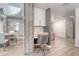 Cozy home office nook adjacent to the dining area, featuring a desk and chair at 1700 Bassett St # 101, Denver, CO 80202