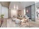 Modern living room with contemporary decor, stylish furniture, and exposed concrete accents at 1700 Bassett St # 101, Denver, CO 80202