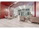 Stunning lobby with comfortable seating, wood accents, and modern lighting fixtures at 1700 Bassett St # 101, Denver, CO 80202