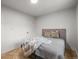Bright bedroom features a comfortable bed, ample natural light, and calming colors at 30938 Niakwa Rd, Evergreen, CO 80439
