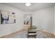 Contemporary dining room with parquet floors, modern rug and a glass-topped table at 30938 Niakwa Rd, Evergreen, CO 80439