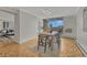 Comfortable dining space with views, an adjacent living space, and stylish seating at 4800 E Hale Pkwy # 802N, Denver, CO 80220