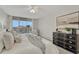 Serene primary bedroom featuring balcony access, ample light, and dark wood accents at 4800 E Hale Pkwy # 802N, Denver, CO 80220