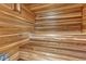 Wood-paneled sauna with benches and heater stones at 4800 E Hale Pkwy # 802N, Denver, CO 80220
