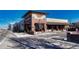 Trader Joe's exterior showcasing its architectural style with a welcoming storefront, adjacent to a street and sidewalk at 4800 E Hale Pkwy # 802N, Denver, CO 80220