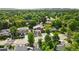 Aerial view of modern home showcasing its location, surrounding greenery, and neighborhood at 2635 Pierce St, Wheat Ridge, CO 80214