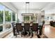 Elegant dining room featuring natural light with views of the backyard at 2635 Pierce St, Wheat Ridge, CO 80214
