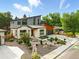 Striking modern home with a two-tone exterior, professional landscaping, and ample parking at 2635 Pierce St, Wheat Ridge, CO 80214