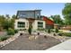Charming two-story home with modern architecture and xeriscaped front yard at 2635 Pierce St, Wheat Ridge, CO 80214