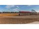 Community baseball field with dugouts at 2937 Pershing St, Strasburg, CO 80136