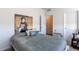 Guest bedroom with double bed and closet at 2937 Pershing St, Strasburg, CO 80136