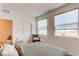 Bright bedroom with large windows and view at 2937 Pershing St, Strasburg, CO 80136
