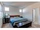 Spacious Primary bedroom with ensuite bathroom access and neutral decor at 2937 Pershing St, Strasburg, CO 80136