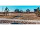 Community playground with homes in background at 2937 Pershing St, Strasburg, CO 80136