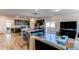 Open living space with hardwood floors and a modern aesthetic at 2937 Pershing St, Strasburg, CO 80136
