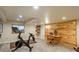 Basement including a workout area with carpet, recessed lighting, and natural lighting at 7750 S Glencoe Way, Centennial, CO 80122