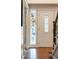 Entryway featuring hardwood floors, staircase, and a stained glass window for added detail at 7750 S Glencoe Way, Centennial, CO 80122