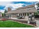 Inviting patio with outdoor seating and grill, perfect for entertaining and enjoying outdoor living at 7750 S Glencoe Way, Centennial, CO 80122