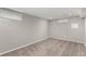 Basement room features neutral walls, carpeting, and recessed lighting at 1463 Dahlia St # 2, Denver, CO 80220