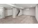 Spacious finished basement featuring neutral paint, carpeting, and closet space at 1463 Dahlia St # 2, Denver, CO 80220