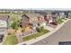 Beautiful two-story home featuring a manicured lawn, charming architectural details, and inviting curb appeal at 4781 Basalt Ridge Cir, Castle Rock, CO 80108