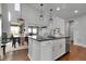 Modern open-concept kitchen featuring stainless steel appliances, a center island, and eat in dining area at 4781 Basalt Ridge Cir, Castle Rock, CO 80108