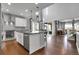 Modern open-concept kitchen featuring stainless steel appliances, a center island, and great light at 4781 Basalt Ridge Cir, Castle Rock, CO 80108