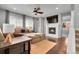 Cozy living room featuring recessed lighting, stylish decor, and lots of natural light from large windows at 4781 Basalt Ridge Cir, Castle Rock, CO 80108