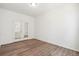 Large room with a home office setup and vinyl plank flooring at 13392 E 110Th Way, Commerce City, CO 80022