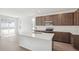 Beautiful kitchen with a large island, stainless steel appliances, and ample cabinet space for all your storage needs at 13392 E 110Th Way, Commerce City, CO 80022