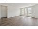 The spacious living area boasts plenty of natural light and smooth hardwood flooring at 13392 E 110Th Way, Commerce City, CO 80022