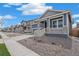 A row of lovely homes showcases this welcoming neighborhood, complete with sidewalks and maintained yards at 13392 E 110Th Way, Commerce City, CO 80022
