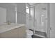 Modern bathroom featuring updated fixtures and a glass enclosed shower at 3520 W Conejos Pl # 14, Denver, CO 80204