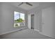Bedroom with a large window that provides ample natural light at 3520 W Conejos Pl # 14, Denver, CO 80204